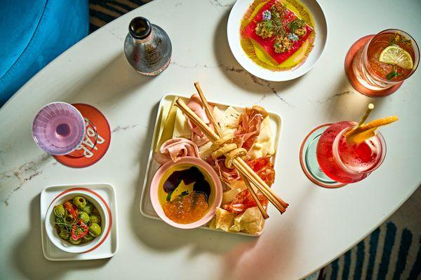 Cocktails & Bites at Bar Sprezzatura Year-Round Rooftop Cocktail Bar