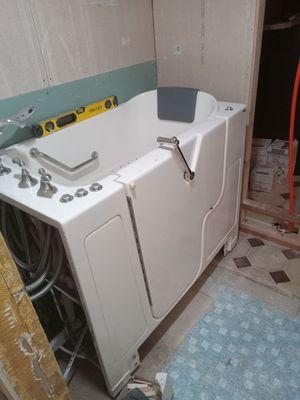 About to install a walk-in jacuzzi tub and tile the bathroom