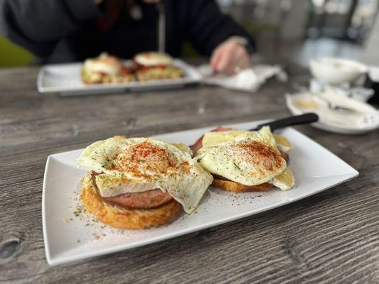 French breakfast (croque madame, foreground) Avocado toast (background)