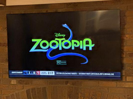 Mounted TV above fireplace