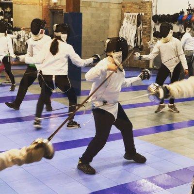 Training hard at Windy City Fencing.