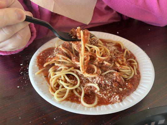 Pasta with meat sauce is their traditional. It's what you want!! Add some Parmesan!!