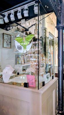 Front of Shop under the Elevator.