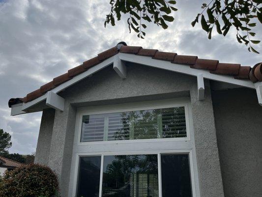 Final "after" picture after final paint touch-up on wood and stucco