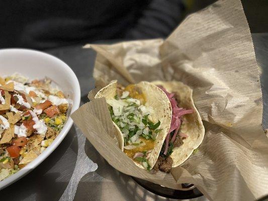 Carnitas taco and Chimichurri Steak Taco