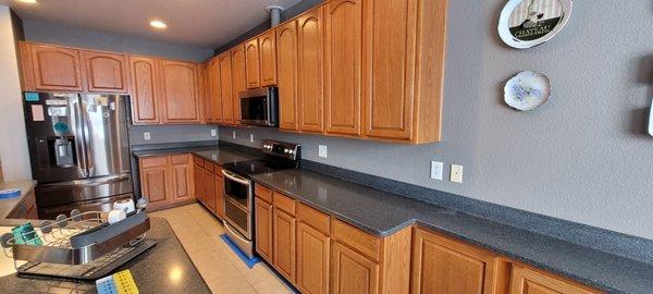 These older Oak cabinets were transformed into a bright modern style white.