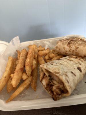 Chicken shawarma wrap with Fries special and lemon pepper over everything.