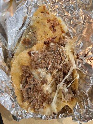 Beef quesadillas on flour. Great flavor and no gristle like some places.