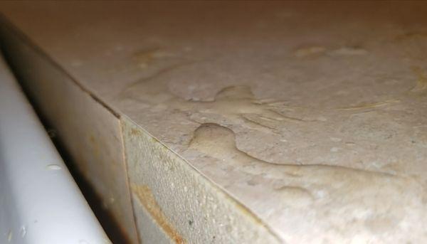 Same hard glue all over counter next to stove