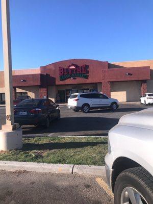 The outside... open for business in an empty strip mall