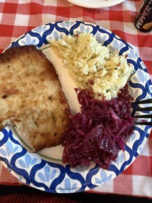 Schnitzel, mashed potatoes, red cabbage
