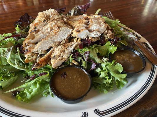 Blue cheese. Walnuts, cranberries, salad topped w/2 fresh chicken breasts sliced. Homemade dressing!