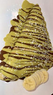 Strawberry banana chocolate with pistachio butter crepe