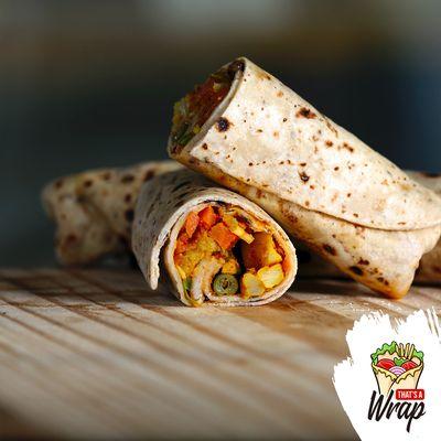 The filling is topped with a sauce prepared by mixing tomato sauce mayo, chilli sauce, and mixed herbs. And a delicious veggie wrap is ready