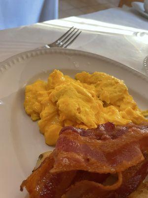 Breakfast Lombardy with scrambled eggs and bacon.