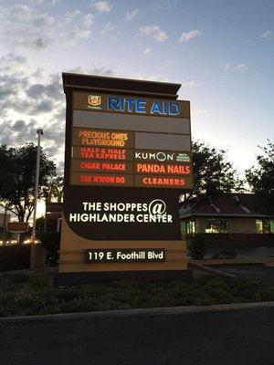 The sign near the entrance to the parking lot