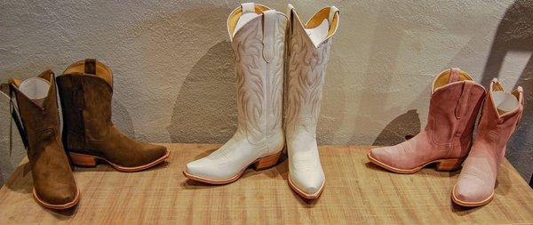 This great Black Star boots! The Hope Booties come in two colors Tan and Pink. And these great Tall White boots! A must for everyone closest