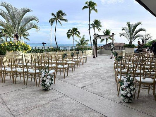 Keani and Sky helped decorate the ceremony from the aisles to the arch