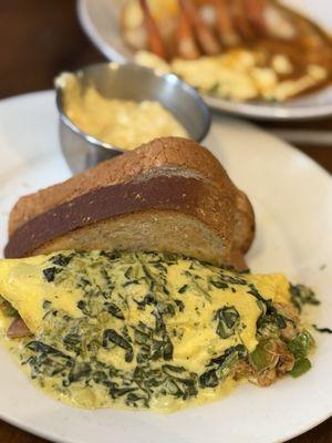 Crab catch omelet (with toast and grits)