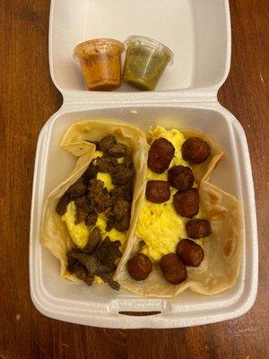 Breakfast tacos! (Steak / Sausage) The red and green salsas are HOT!! Very good tacos. Will be back.