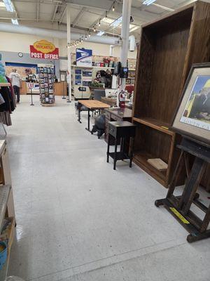 In the back of the hardware store next to post office