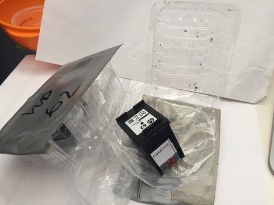 $5 Refilled ink cartridges, placed in a ziplock bag, in a seaweed container with seaweed crumbs? Wtf? Weird but the ink worked VERY well.