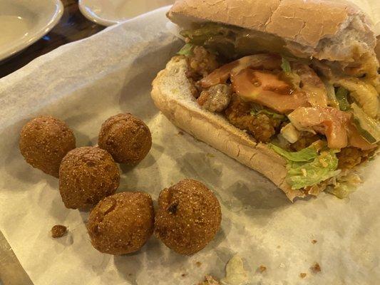 Already started eating this half of a Shrimp Po Boy and dug into the hush puppies when I remembered to take the pic !