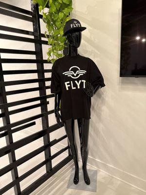 Our branded merch inside our store.