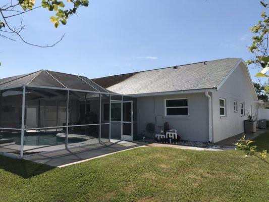 Shingle roof after 1/2 cleaned to show the difference.