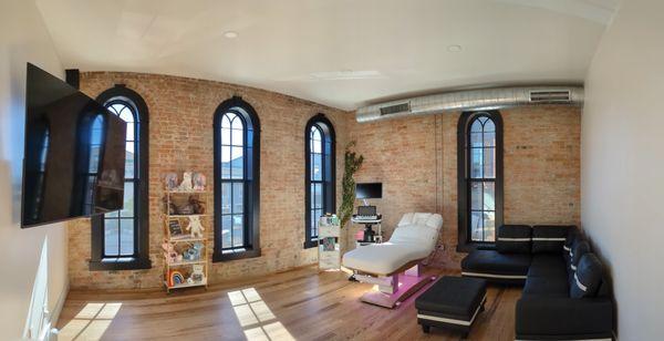 Our viewing room offers a warm and vibrant feel.