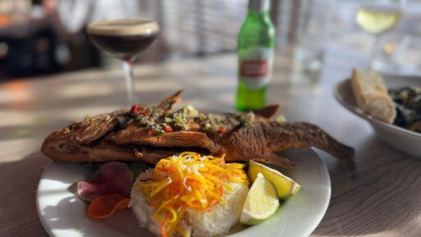 Whole seasonal snapper with coconut rice.