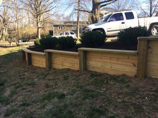 Showing Custom Retainment Wall made out of treated wood. Winchester, KY