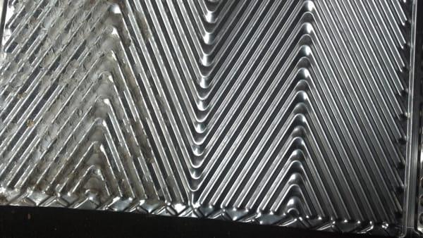 dry ice blasting hard water build from heat exchangers with secondary waste