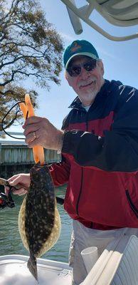 My first flounder caught. What a fantastic boat charter. Half day fishing the bay.