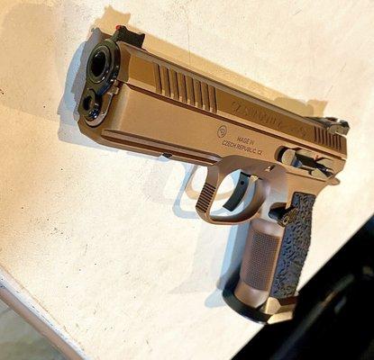 Black DLC on barrel, bushings, and magwell