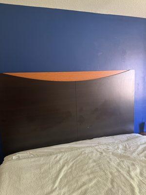 Grease stains and bodily fluids on the headboard we purchased a mattress protector and slept the opposite way.