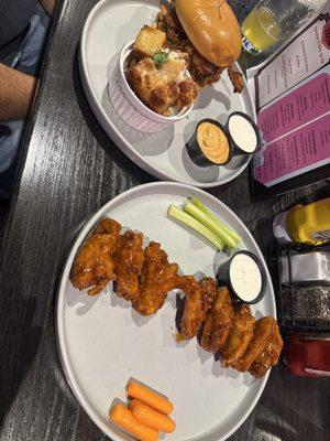 first time trying and the hot honey garlic wings, parm garlic wings, and Triple Bougie Burger with cheese curds were very good!