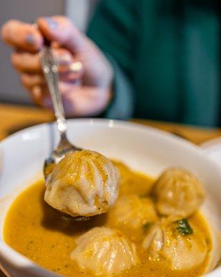 Chicken Momo w/ jhol ($13) off-the-menu