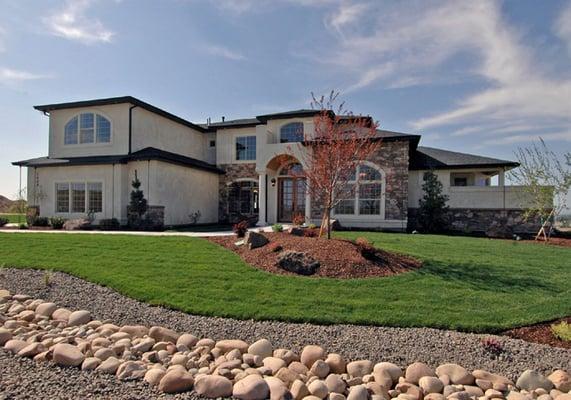 Mediterranean elevation of custom home.