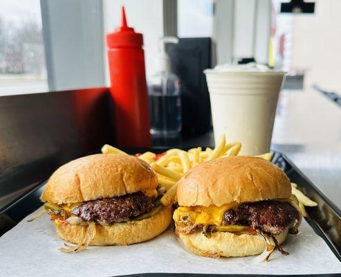 Motz's fresh beef cheeseburger sliders, shoestring french fries and vanilla milkshake.