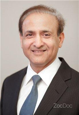 Dr. Suresh Vakharia MDS, DDS, FAGD
