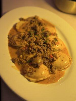 Hand crafted ravioli with bolognese