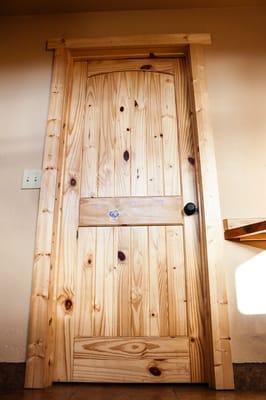 Knotty pine door provide a rustic look