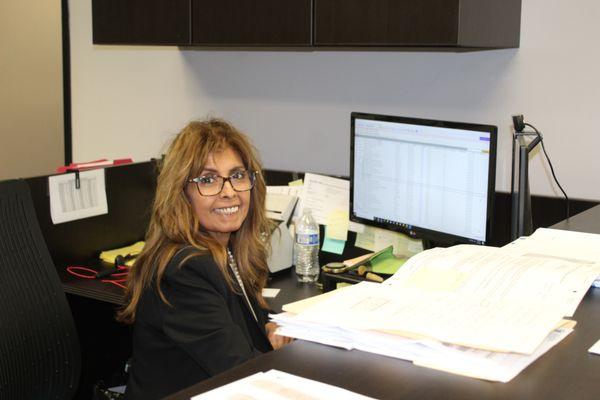 Accounting Team Member working at desk