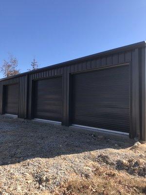 All steel building with (3) 12x10 roll up doors call for pricing 256-691-9549
