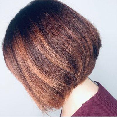 Shoulder length haircut with copper balayage and warm brown hair color