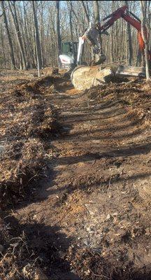 Unfinished yard he dug up & left like this