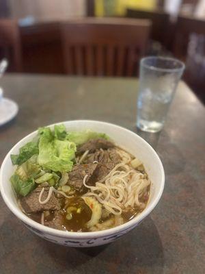 I ordered beef with rice but this is what they sat in front of me. It's beef with noodles in a soup bowl with lettuce