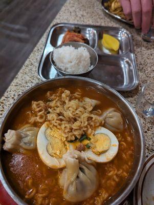 JJ Noodles and kimchi side. Fermented radishes.