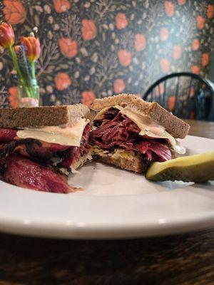 Hot pastrami with Swiss cheese on artisan rye bread. Yum!